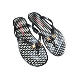 Coach Black and Gold Jelly Sandals